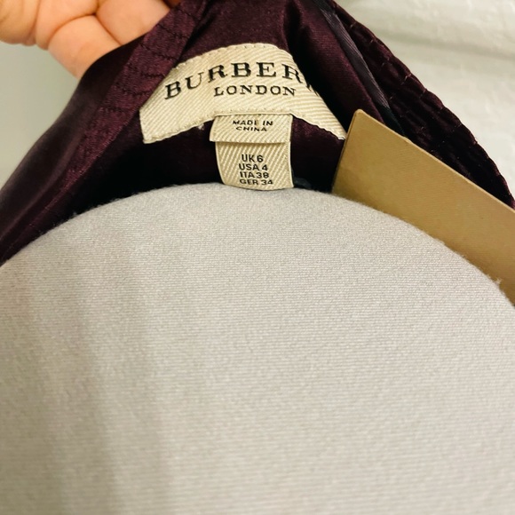 New authentic Burberry silk stretchy blouse in burgundy  with a bow on a front. - Picture 7 of 8